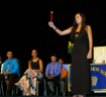 Vice President Alex Pigeon exemplifies the torch, symbolic of the National Honor Society.