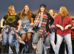 Rockland High Chorus members dance to the finale from Rent. Kalee Lucier-Hill, Rebeca Portela, Stephanie Blaney, Sara Kane