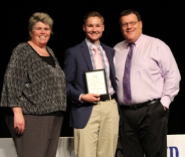Ms Paudling and Mr Damon with sophomore, Tyler Beatrice who won the overall academic achievement award.