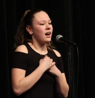 Junior Kayla Mantell leads off the solo performances with "Once Upon a Time" from the muiscal Brooklyn.