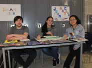 Bryce Taylor, Jessica Driscoll and Danting Zhu at the Art Club table.